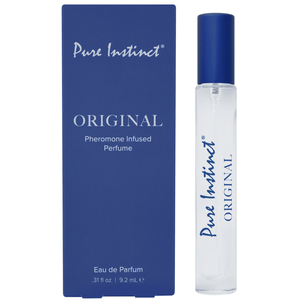 Pure Instinct Original pheromone perfume Australia – a sleek spray bottle displayed next to its signature blue box, designed to enhance attraction with pheromones.