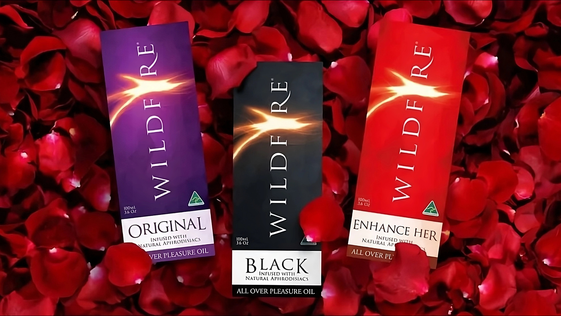 massage oil sexually with wildfire pleasure oil boxes on rose petals