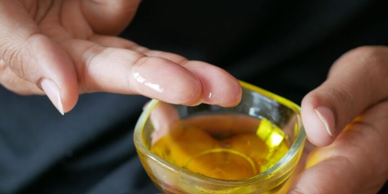 what is a carrier oil plant based carrier oil texture applied to skin between fingers
