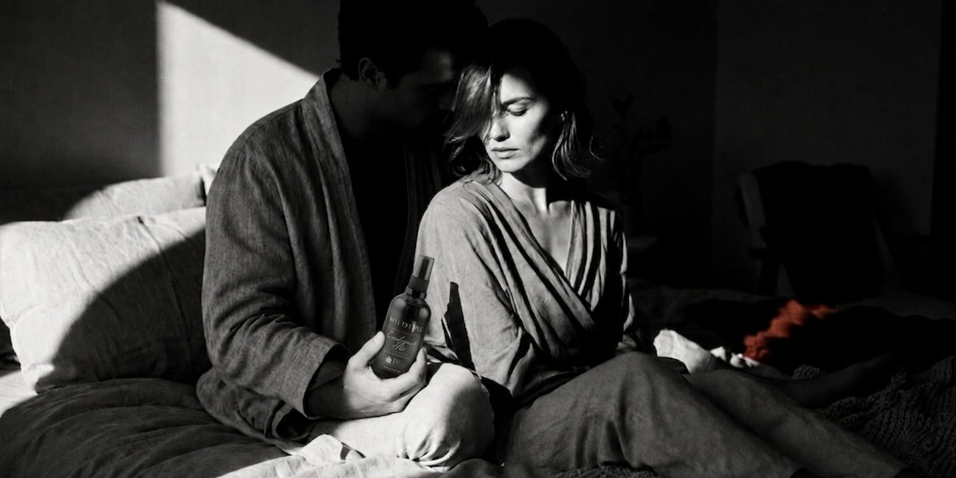 How to do a couples massage at home with massage oil in a softly lit bedroom